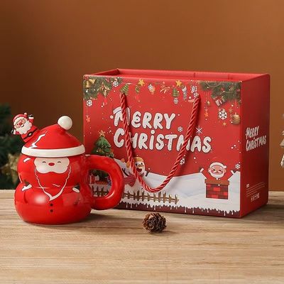 Keramische kerstbeker met logo en lepel