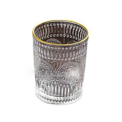 Vintage glas mok met gouden rand met zonnebloem ontwerp en klassieke stijl