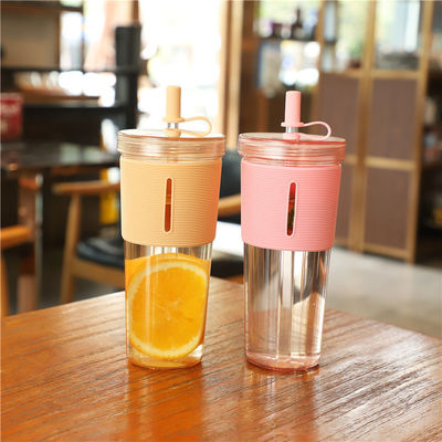 Dubbelwand plastic herbruikbare bubbel theebeker met 700 ml capaciteit en siliconen mouw