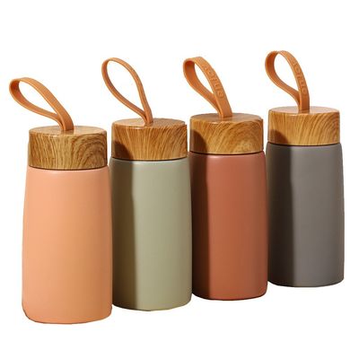 Voorbeeld 280ML Houtkorrel roestvrij staal bekertje voor Custom Logo Kids Sport waterfles